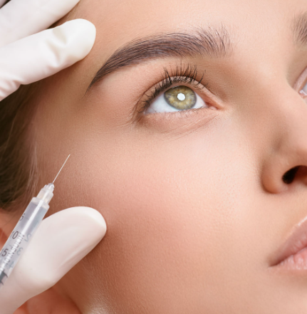 Woman receiving anti wrinkle injection in the crows feet